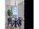 Dining area boasts city views and modern light fixtures at 891 14Th St # 3204, Denver, CO 80202