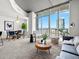 Bright living room boasts city views, and contemporary furniture at 891 14Th St # 3204, Denver, CO 80202