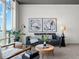 Modern living room with neutral colors and sophisticated artwork at 891 14Th St # 3204, Denver, CO 80202