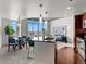 Bright living space with modern furnishings, an island and expansive windows with city views at 891 14Th St # 3204, Denver, CO 80202