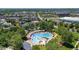 Aerial view of the community pool, showcasing its ample lounging areas, splash features and inviting layout at 8739 E 23Rd Ave, Denver, CO 80238