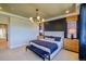 Elegant bedroom with contemporary decor, ambient lighting, and a comfortable atmosphere at 8795 Hugo Dr, Littleton, CO 80125