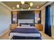 Beautiful bedroom with modern lighting, stylish decor, and a comfortable bed at 8795 Hugo Dr, Littleton, CO 80125