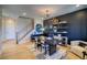 Chic living space with a modern staircase, stylish decor, and plenty of natural light at 8795 Hugo Dr, Littleton, CO 80125