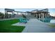 Community pool with lounge chairs and landscaped surroundings for relaxing outdoors at 8795 Hugo Dr, Littleton, CO 80125