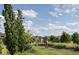 People riding bikes on a walking path in the community at 8795 Hugo Dr, Littleton, CO 80125