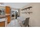 Charming dining area with sliding glass door to outdoor patio and neutral color palette at 17151 E Stanford Ave # B, Aurora, CO 80015