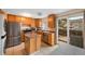 Kitchen with stainless appliances, ample cabinetry and a convenient island for food preparation at 17151 E Stanford Ave # B, Aurora, CO 80015