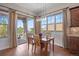 Dining area with hardwood floors, a view and slider access to the outdoor deck at 4336 Chateau Ridge Rd, Castle Rock, CO 80108