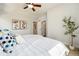 Bright and airy main bedroom with neutral tones, carpet, and large windows at 1063 Roslyn Ct, Denver, CO 80230