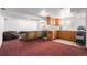 Spacious basement area featuring kitchenette and ample seating area for relaxing and entertaining at 28800 E 168Th Ave, Brighton, CO 80603