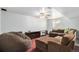 Finished basement area with plush seating, entertainment center, and ample space for activities at 28800 E 168Th Ave, Brighton, CO 80603
