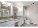 Bright bathroom features double sink vanity, granite countertops, and a glass enclosed shower at 28800 E 168Th Ave, Brighton, CO 80603