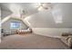 Upstairs bedroom features high ceilings, carpet floors, skylight and a big window at 28800 E 168Th Ave, Brighton, CO 80603