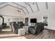 Relaxing living room with vaulted ceilings, ceiling fans, a fireplace and comfortable seating for entertaining or relaxing at 28800 E 168Th Ave, Brighton, CO 80603