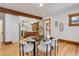 Bright dining room featuring an open floor plan and hardwood floors at 729 E 10Th Ave, Denver, CO 80203