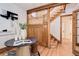 Inviting foyer featuring hardwood floors, an elegant staircase, and a stylish table with decorative accents at 729 E 10Th Ave, Denver, CO 80203