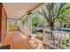Expansive front porch with stately pillars, offering ample space for outdoor relaxation and neighborhood views at 729 E 10Th Ave, Denver, CO 80203
