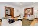 Bright living room showcasing hardwood floors, stylish furnishings, and an open layout for comfortable living at 729 E 10Th Ave, Denver, CO 80203