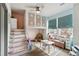 Playful room with built-in loft, cozy seating, and bright window, creating an inspiring space at 13329 Newport Cir, Thornton, CO 80602