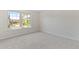 Bright bedroom with natural light from the large windows at 9100 E Girard Ave # 7, Denver, CO 80231