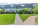Charming townhome with well-maintained landscaping and a walkway at 9100 E Girard Ave # 7, Denver, CO 80231
