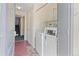 Functional laundry area with washer, dryer, and storage options at 9100 E Girard Ave # 7, Denver, CO 80231