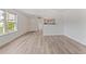 Open-concept living area boasts durable floors, fresh paint, and natural light at 9100 E Girard Ave # 7, Denver, CO 80231