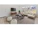 Inviting living room features comfortable seating, modern decor, and natural light from large windows at 9100 E Girard Ave # 7, Denver, CO 80231