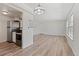 Bright living room with stainless steel appliances and natural light from the large windows at 9100 E Girard Ave # 7, Denver, CO 80231