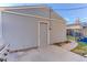 Exterior view of the detached garage featuring painted siding and a convenient concrete driveway at 515 S Grant St, Denver, CO 80209