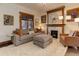 Inviting living room featuring a decorative fireplace, comfortable seating, and natural light at 515 S Grant St, Denver, CO 80209