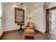 Sitting area with hardwood floors, chair, ottoman and window at 515 S Grant St, Denver, CO 80209