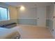 Bedroom with built-in bench and window bringing in lots of light at 2667 E 132Nd Ave, Thornton, CO 80241