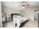 Cozy bedroom with ceiling fan, carpeted floor, and soft neutral colors creating a relaxing atmosphere at 2667 E 132Nd Ave, Thornton, CO 80241