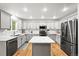 Stylish kitchen with white cabinets, granite countertops, and stainless steel appliances at 2667 E 132Nd Ave, Thornton, CO 80241