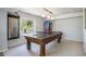Recreation room featuring a pool table, vending machine, and ample space for entertaining at 1240 Lone Scout Lookout, Monument, CO 80132