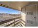 Balcony view showcasing a mountain landscape and neighborhood below at 519 Wright St # 304, Lakewood, CO 80228