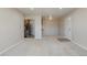 Comfortable open living space with a carpeted dining area and renovated kitchen at 519 Wright St # 304, Lakewood, CO 80228