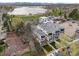 Aerial view showcasing a modern townhome community with lake views and nearby amenities at 1737 Lowell Blvd, Denver, CO 80204