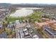 Panoramic aerial view highlighting the townhome community's location near a lake and green spaces at 1737 Lowell Blvd, Denver, CO 80204