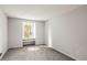 Bright and neutral bedroom featuring a window seat and natural light at 943 S Fairplay St, Aurora, CO 80012