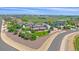 Aerial view of a two-story home with mature trees and professional landscaping at 8655 E 130Th Ave, Thornton, CO 80602