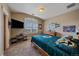 Cozy bedroom featuring Green Bay Packers decor, natural light, and a calming neutral color palette at 8655 E 130Th Ave, Thornton, CO 80602