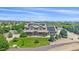 Beautiful two-story home with a well-manicured lawn and solar panels at 8655 E 130Th Ave, Thornton, CO 80602