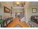Grand foyer featuring hardwood floors, staircase, and a decorative chandelier at 8655 E 130Th Ave, Thornton, CO 80602