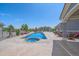 Beautiful backyard swimming pool with a built-in hot tub and a spacious patio for relaxation at 8655 E 130Th Ave, Thornton, CO 80602