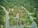Aerial view of a home nestled among lush trees at 7312 Marshall Rd, Larkspur, CO 80118