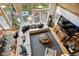Stylish living room features a comfortable sectional, wood burning stove, and an open layout at 7312 Marshall Rd, Larkspur, CO 80118