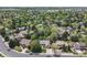 An aerial shot showcasing a neighborhood with tree-lined streets and well-maintained homes at 3775 S Poplar St, Denver, CO 80237